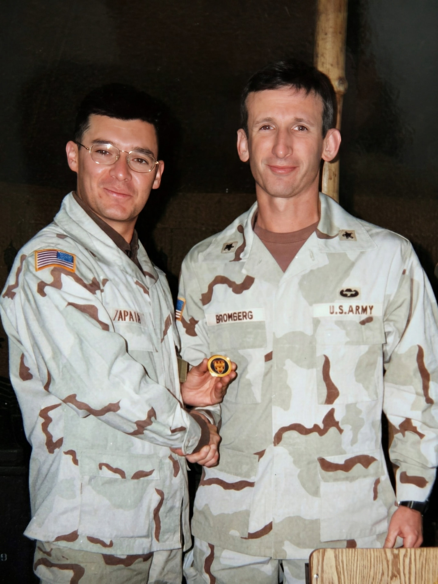 David F. Zapata receiving a commander's coin